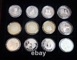 12 Silver proof Coins (in a 24 size box with extra tray). 925 silver & COAs